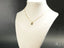 Gold chain necklace with petite lock small locker pendant featuring heart design in art gold jewelry