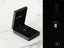 Open black jewelry box with gold ring and padlock charm showcasing Petite Lock small locker pendant art gold jewelry