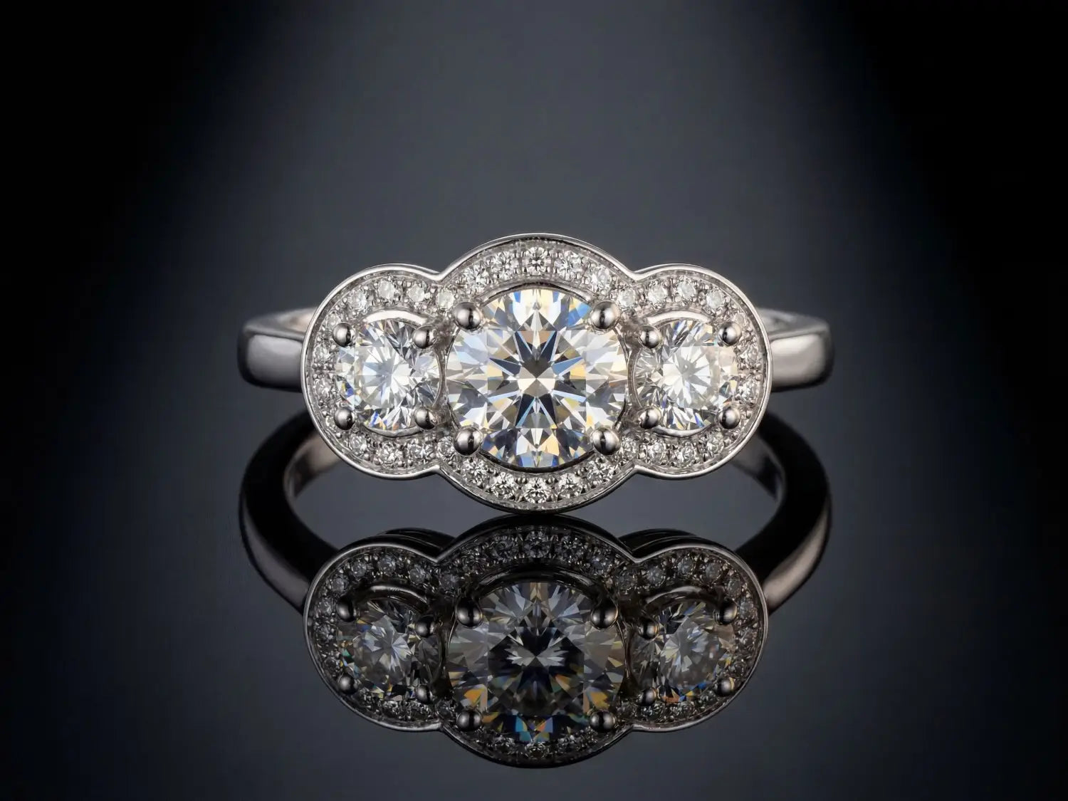 A delicate rose gold engagement ring with square-cut diamond and pavé diamonds crafted in 18k gold fine jewelry.