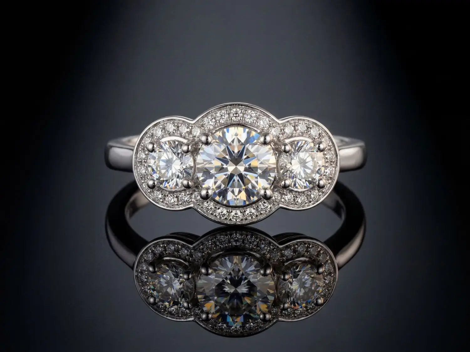 gold wedding bands with intricate geometric patterns and diamonds crafted as 18k gold jewelry for engagement rings.