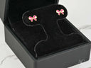 18K gold pink bow earrings with playful enamel charm design