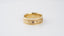 Royal Crest: Elegant Wedding Band with Textured Accents