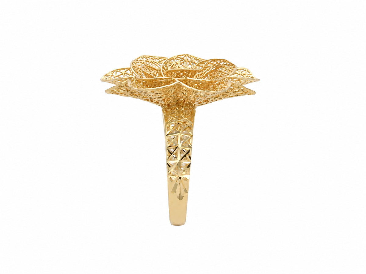 Side profile view of 18K gold flower ring showing vertical bloom structure and geometric band