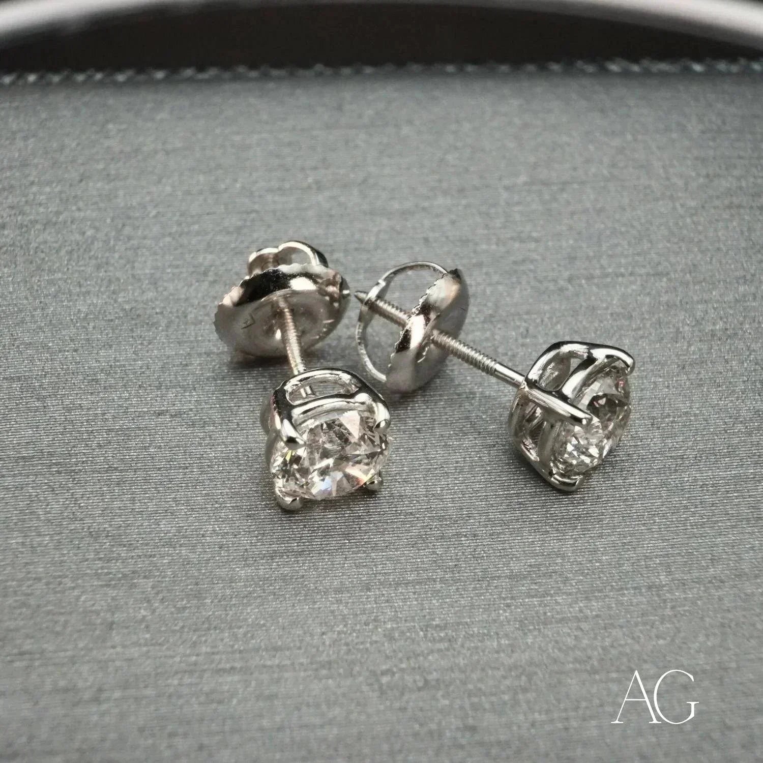Radiant 18k white gold diamond earrings with round brilliant studs