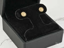 Radiant Blossom gold CZ flower earrings in solid 18K gold on velvet stand