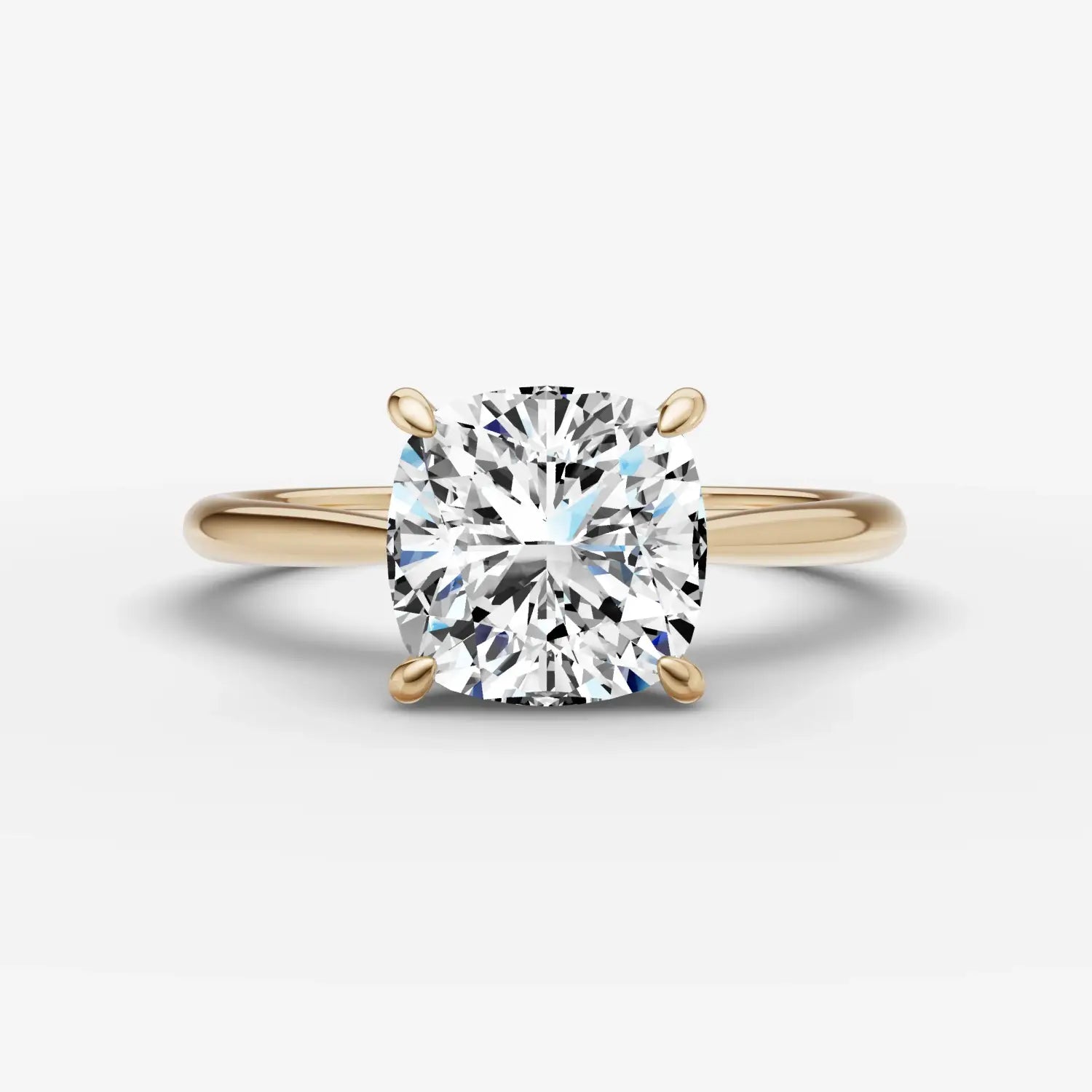 vibrant yellow and red geometrically faceted gemstones arranged in a radial pattern for engagement rings at everett jewelry store