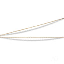 Two delicate 18k gold diamond cut chains with small uniform links