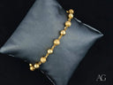 Radiant Elegance solid 18k gold bracelet with spring ring clasp and spherical beads