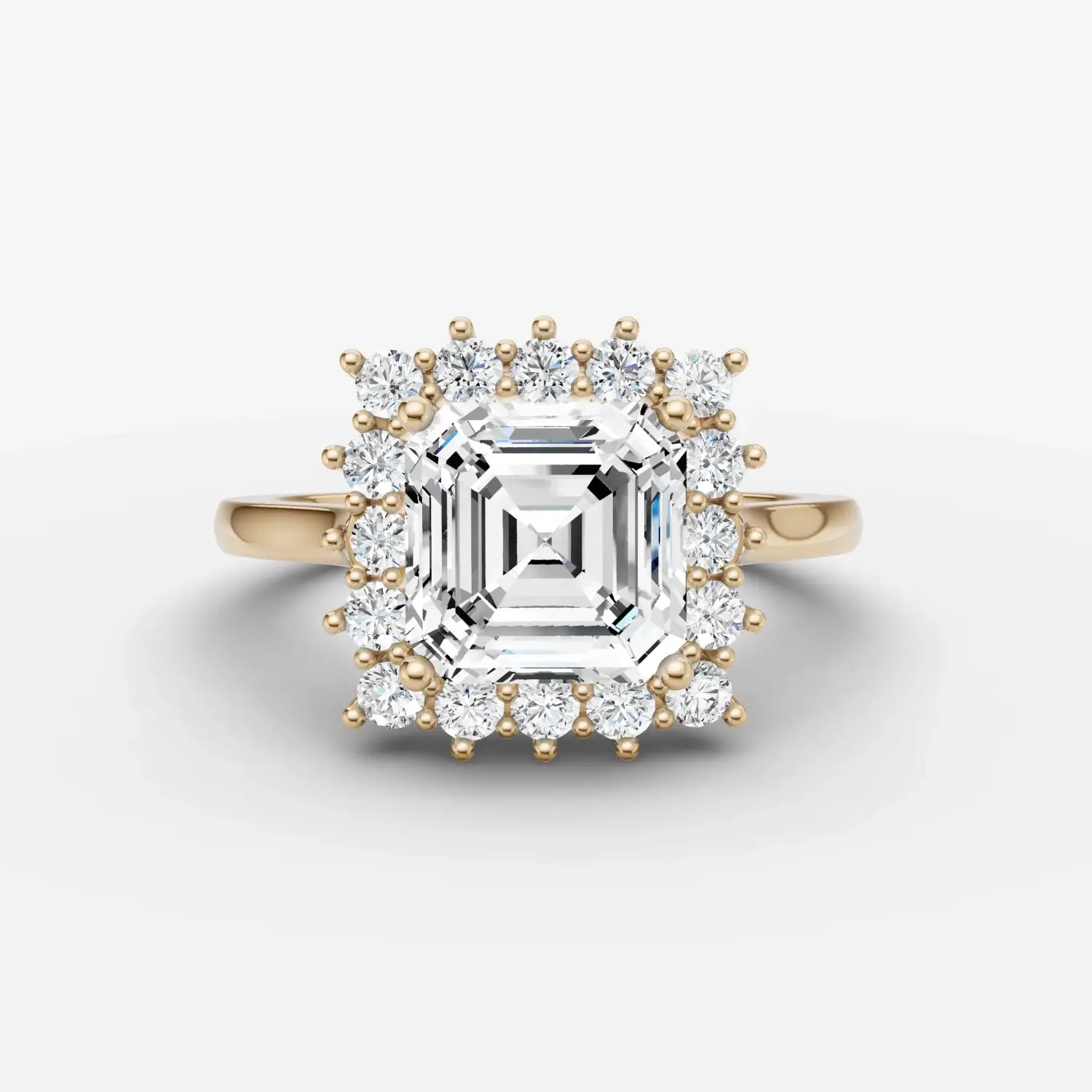 silver thimble with intricate floral engraving and central red gemstone featured in engagement rings at everett jewelry store