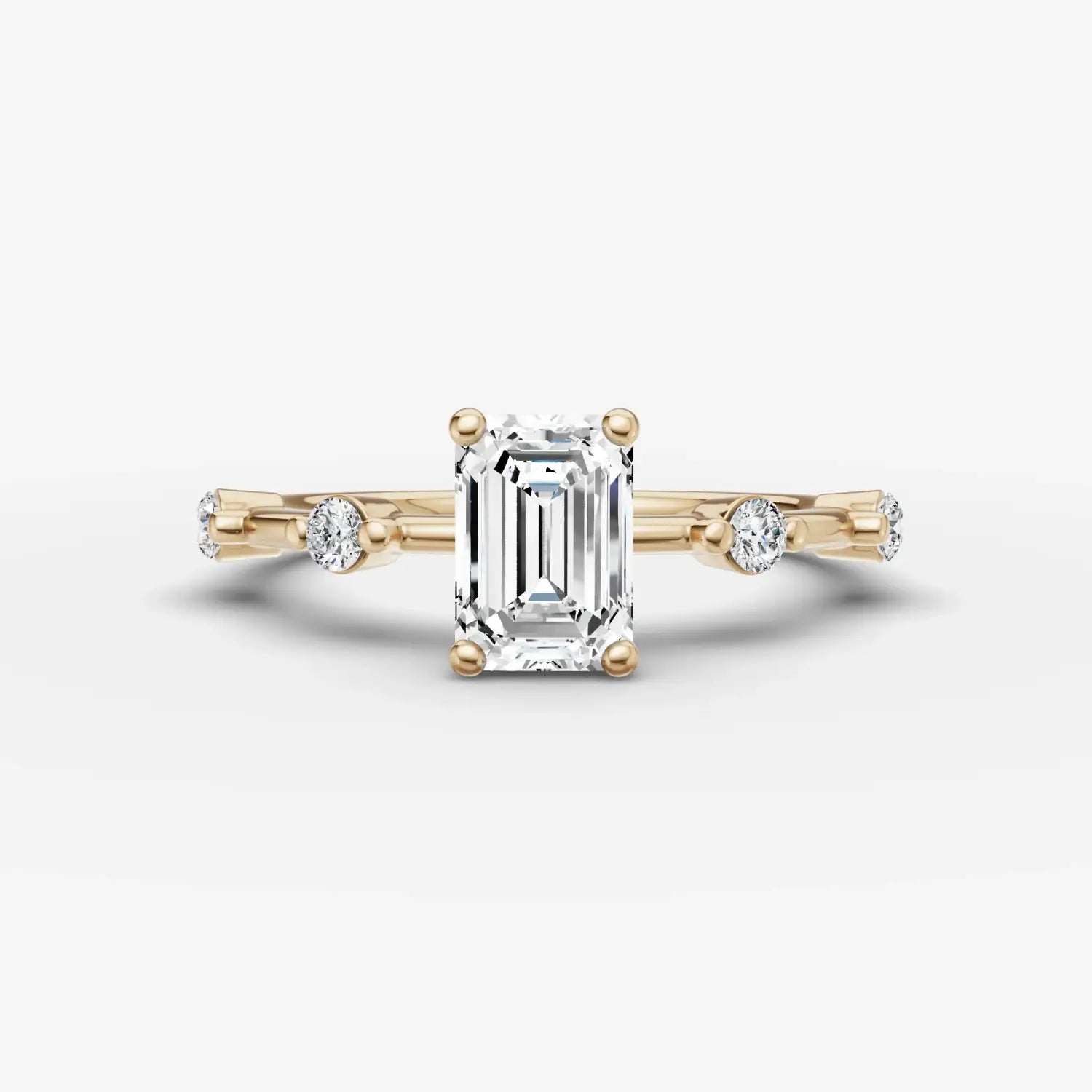 vibrant yellow and red faceted gemstones arranged in a radial pattern illustrating lab-grown diamonds for engagement rings and artgold jewelry