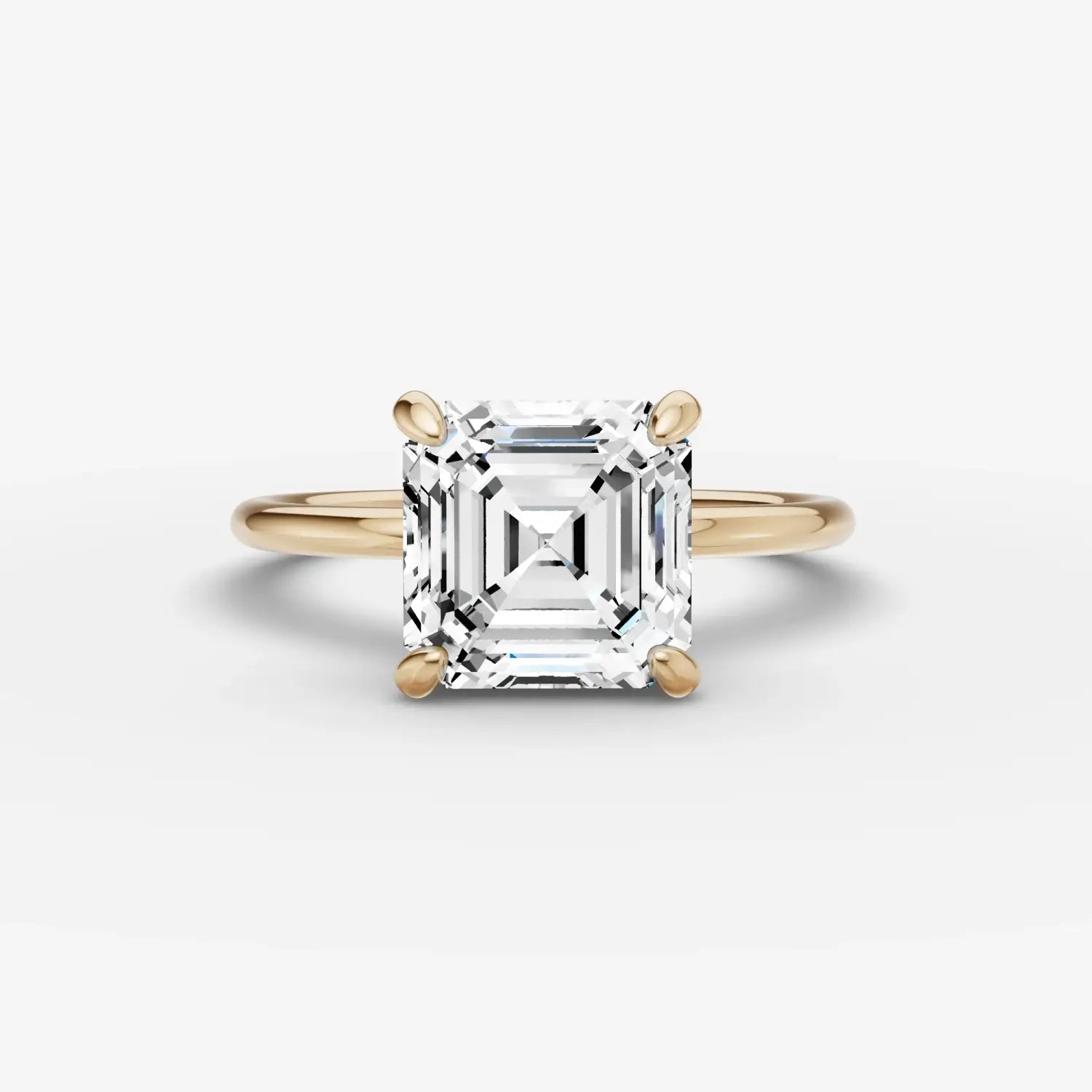 a collection of sparkling diamonds in various shapes on a black surface highlighting art gold and 18k gold jewelry
