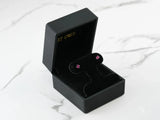 18k white gold CZ stud earrings in black velvet box