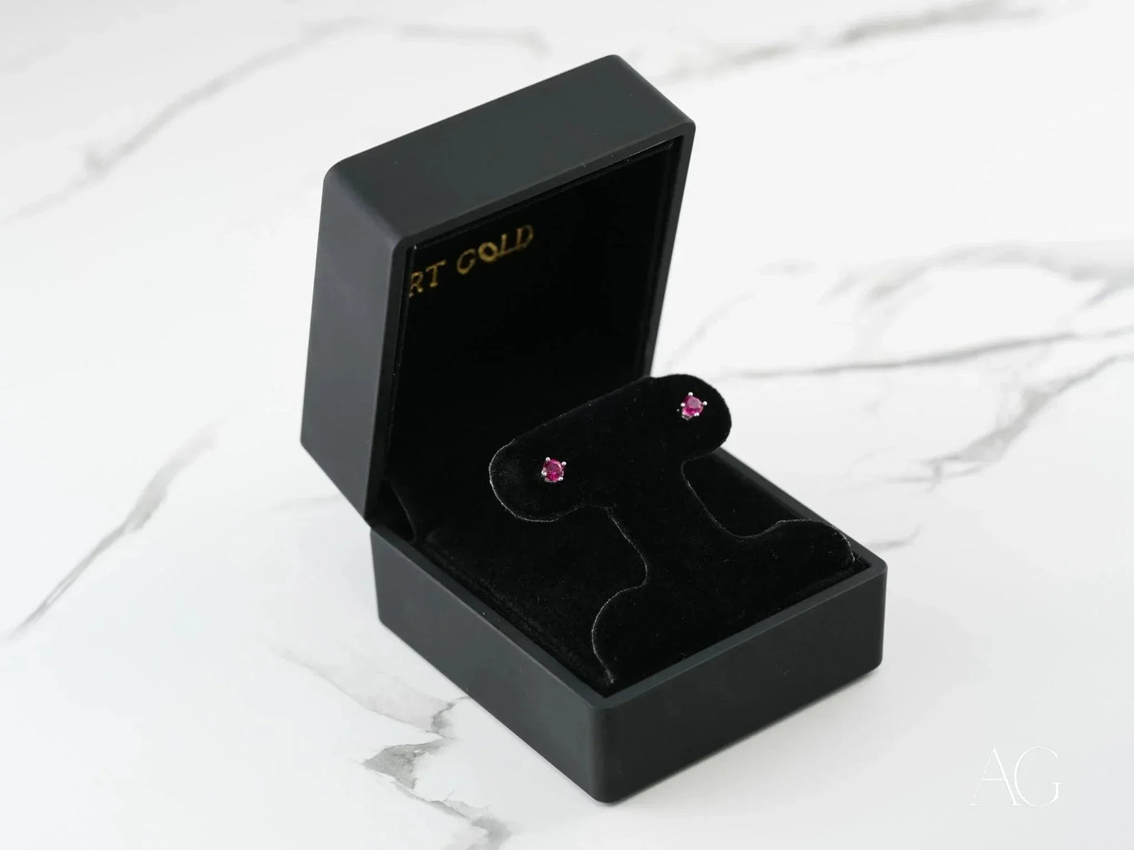 18k white gold CZ stud earrings in black velvet box