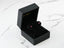 Black velvet jewelry box with 18k white gold CZ stud earrings featuring pink gemstones
