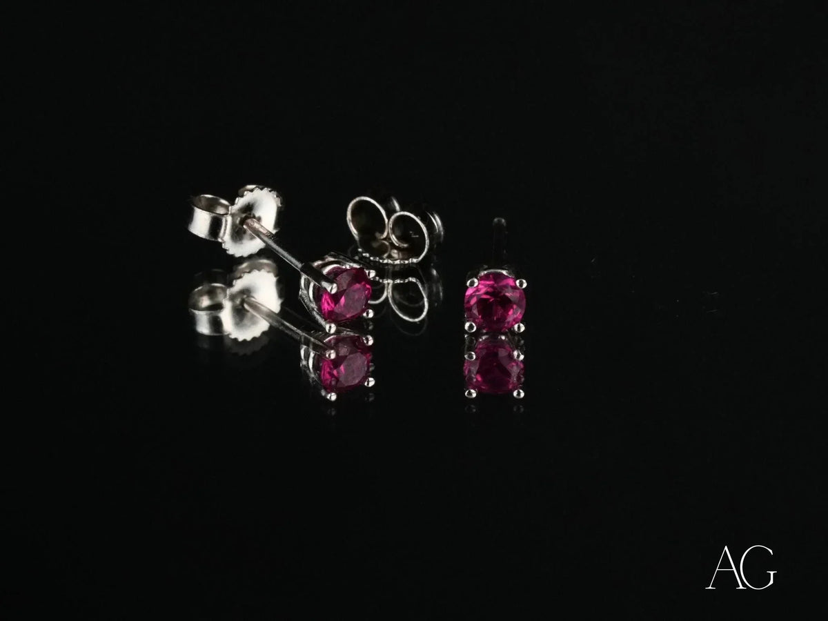 Two pairs of radiant 18k white gold CZ stud earrings in art gold jewelry