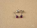 Radiant Glow: 18k White Gold CZ Stud Earrings