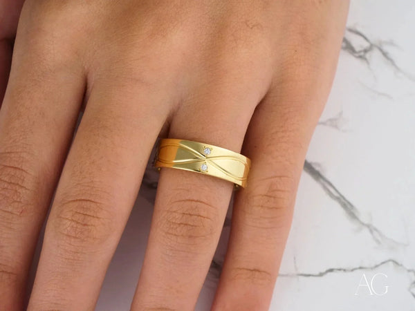 Radiant Harmony Wedding Band: polished gold ring with two diamonds
