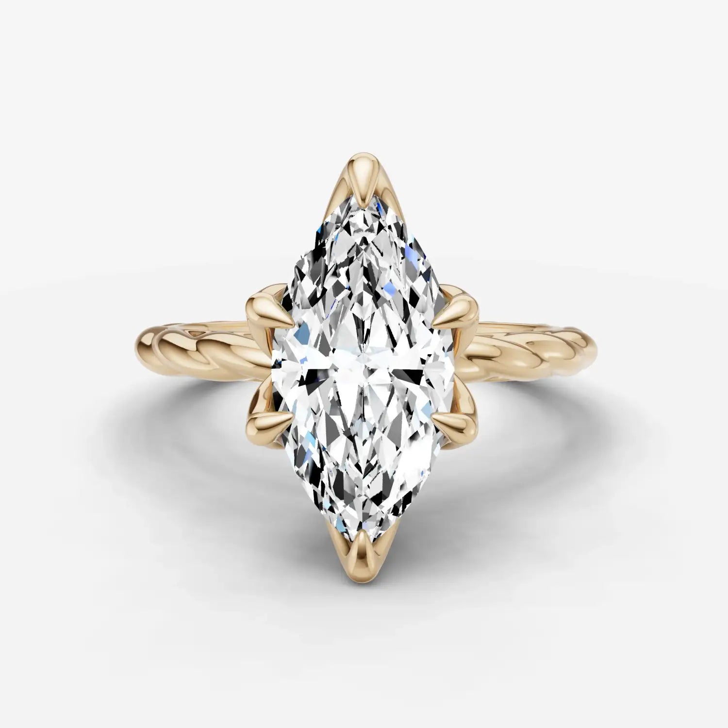 a delicate gold jewelry ring with a textured band rests inside a cream boucheron fine jewelry box