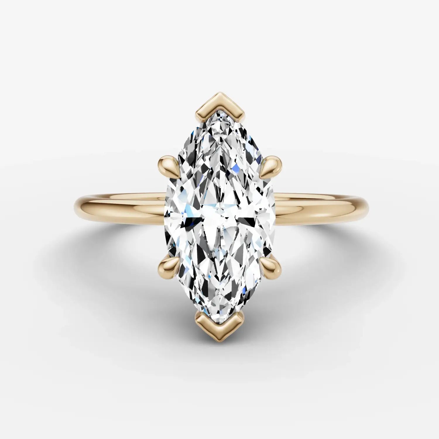 silver thimble with intricate floral engraving and central red gemstone featured in engagement rings at everett jewelry store