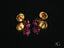 Gold stud earrings with ruby-red cubic zirconia heart-shaped stones in high-quality 18k gold