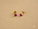 Radiant Ruby: 18k gold ruby-red CZ heart stud earrings