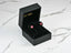 Black jewelry box with Radiant Ruby Sparkle 18K Gold Red cubic zirconia stud earrings