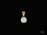 Radiant solitaire pendant in art gold jewelry with brilliant-cut diamond