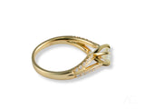 Radiant Vow engagement ring in 18k yellow gold with round diamond pavé accents