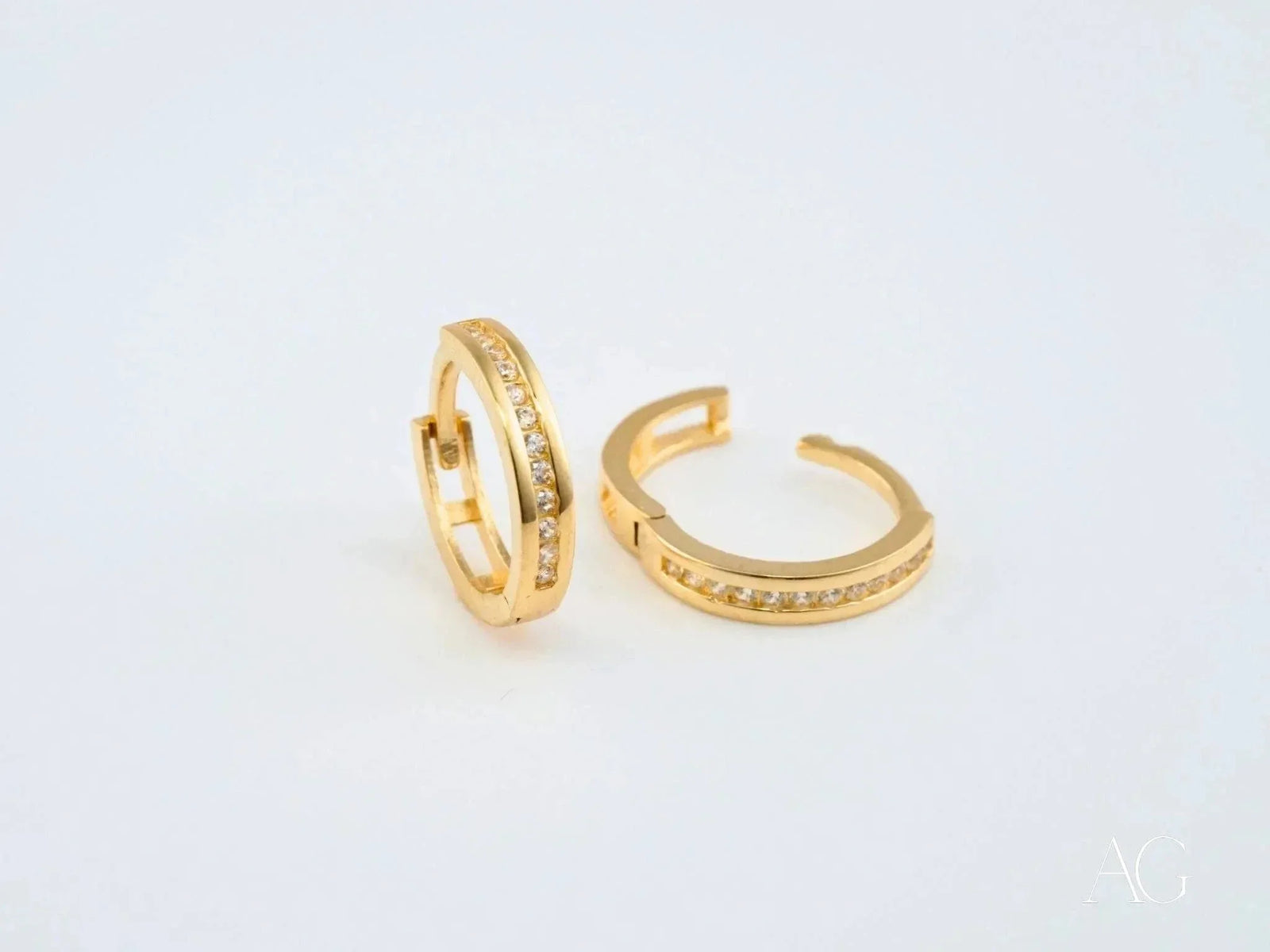 Radiate Love mini hoops in 18k yellow gold CZ