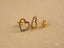 Gold-toned multicolor heart earrings with rainbow CZ stones in elegant art gold jewelry style