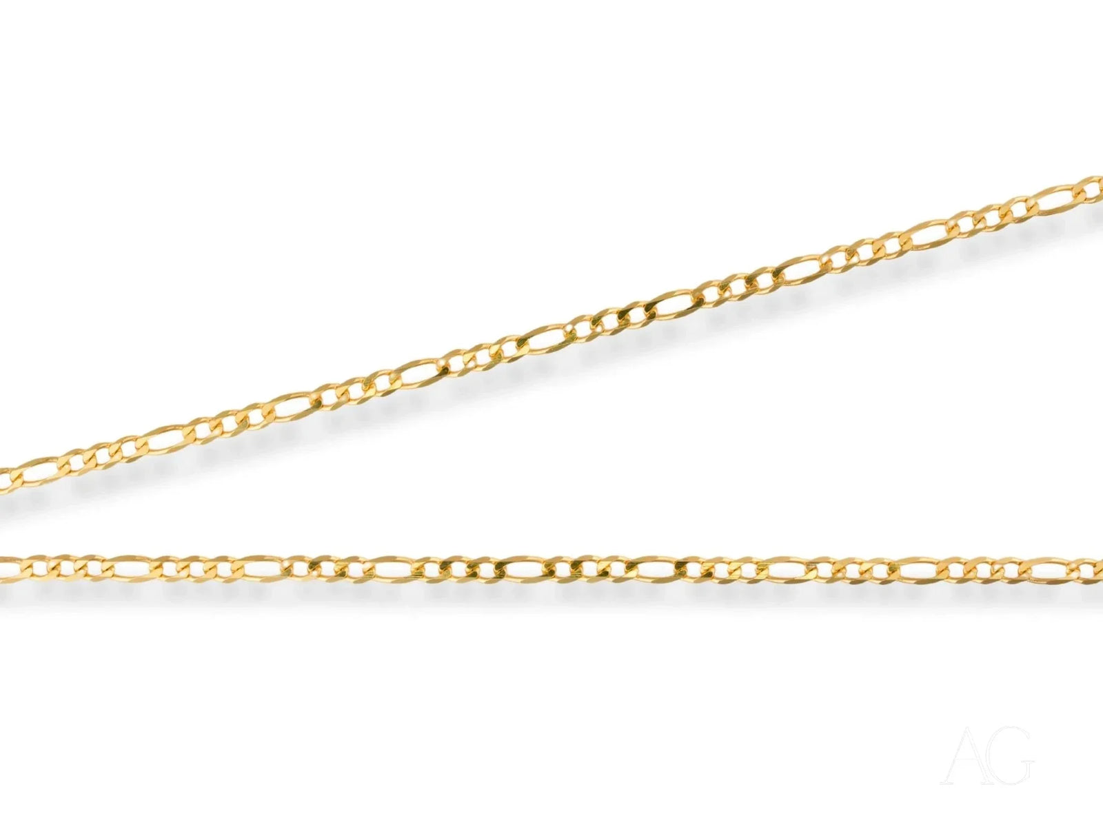 Two delicate 18K yellow gold Figaro chains in Regal Prestige art gold jewelry