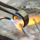 Art gold jewelry repair: heating ring with torch in Greater Boston area