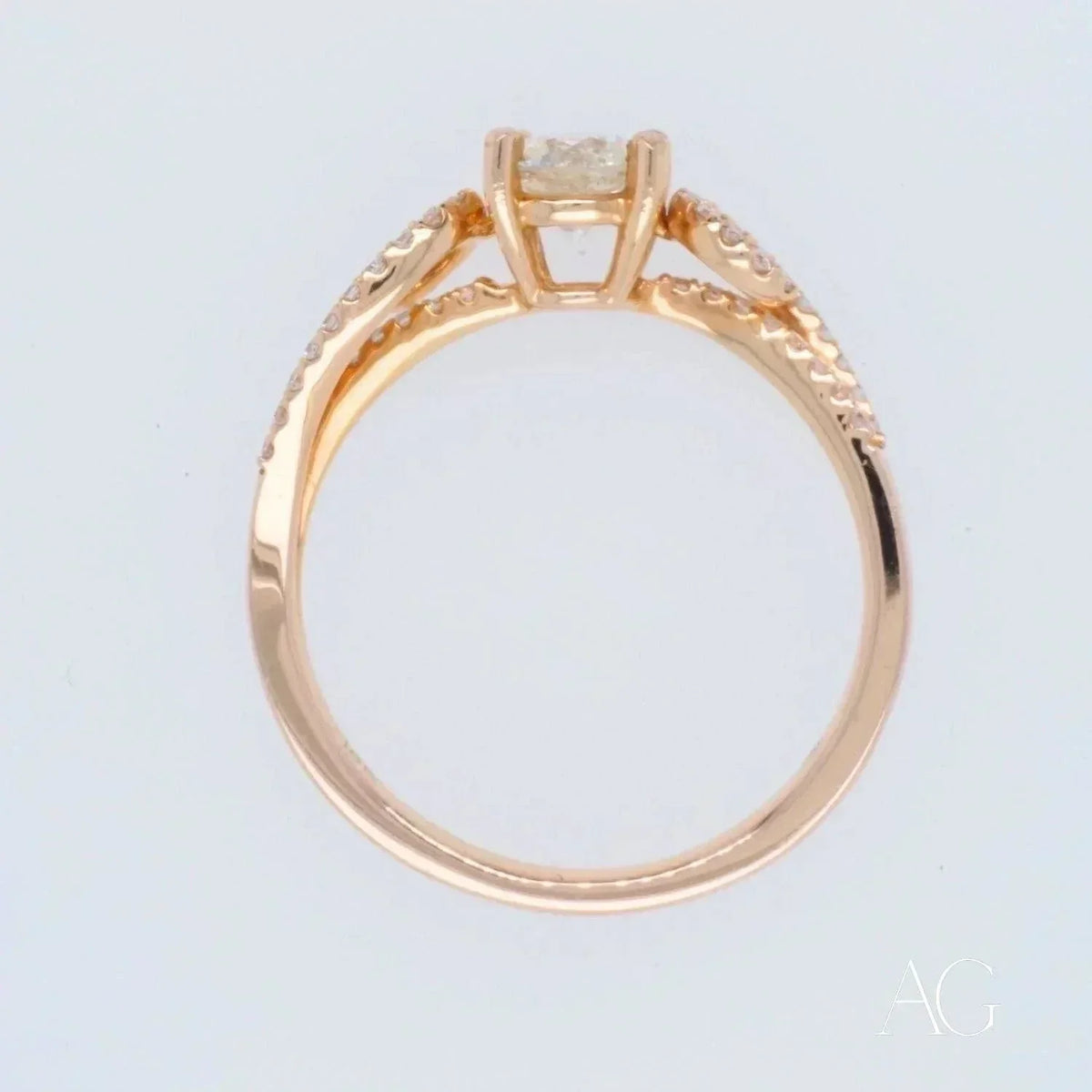 Romantic 18k rose gold cushion-cut diamond ring with pavé side stones