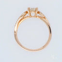 Romantic 18k rose gold cushion-cut diamond ring with pavé side stones