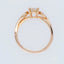 Romantic 18k rose gold diamond ring with cushion-cut center and pavé side stones