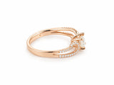 Romantic 18K rose gold diamond ring, side profile of the split shank and the raised center setting