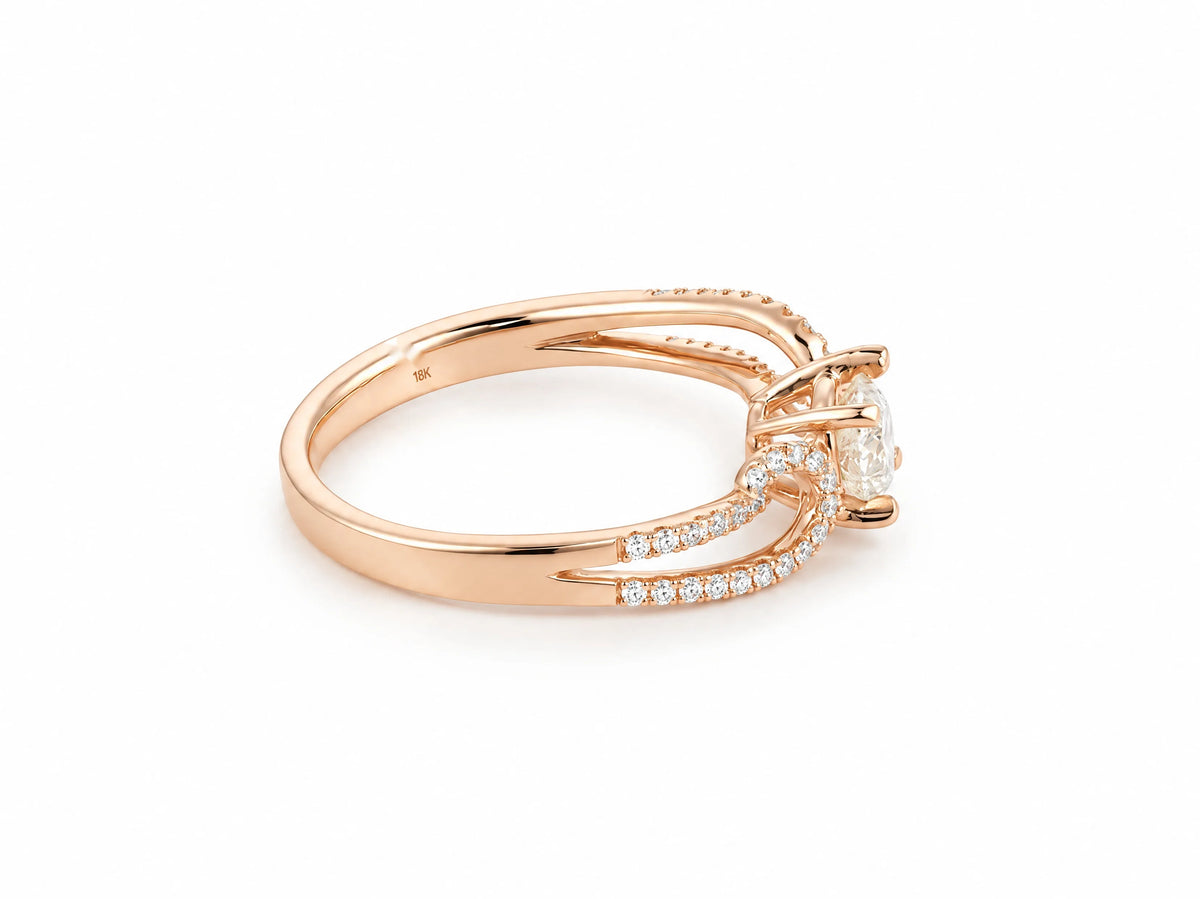 Romantic 18K rose gold diamond ring, side profile of the split shank and the raised center setting
