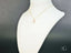 Rosé Radiance Pink CZ Pendant showcasing art gold jewelry with pink cubic zirconia
