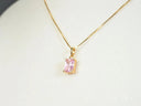 Rosé Radiance pink CZ pendant in art gold jewelry with rectangular gem