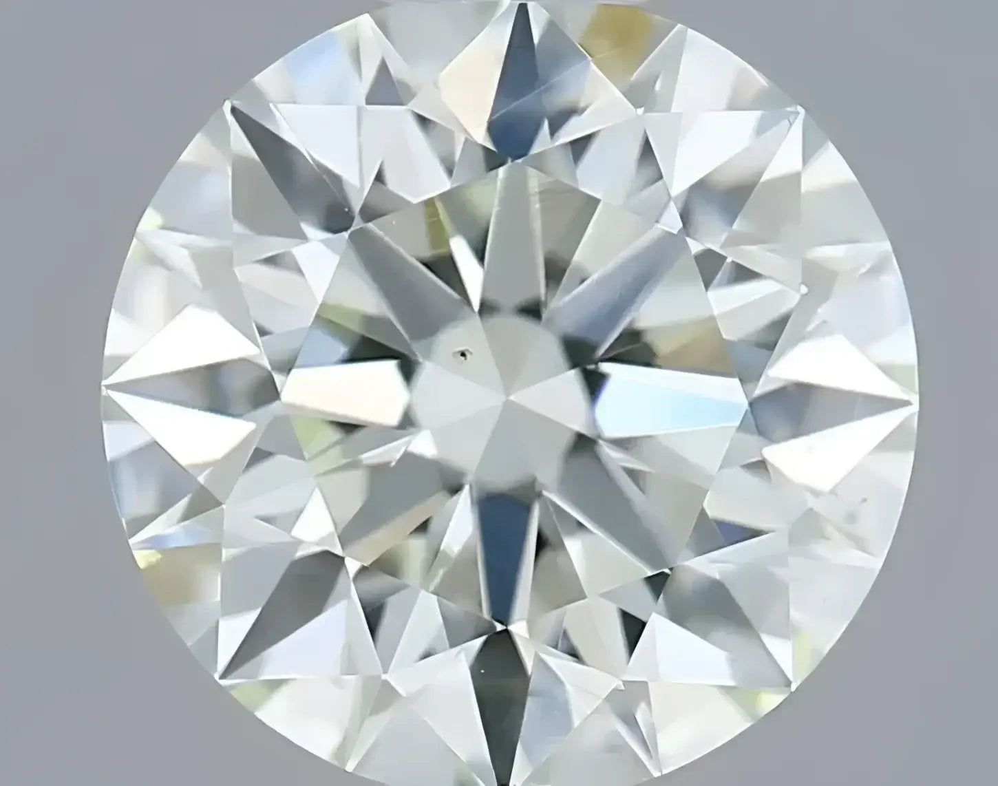 a round brilliant-cut diamond with clear sparkling appearance and precise faceting featured in an article on the captivating journey of gold jewelry through time highlighting art gold jewelry and royal jewels traditions