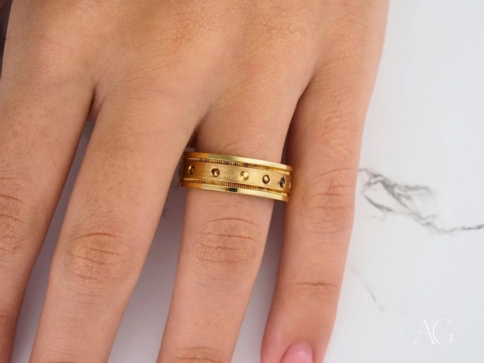 Royal Crest wide gold band ring with textured accents