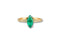 Elegant 18k gold ring with marquise-shaped cubic zirconia and diamond accents