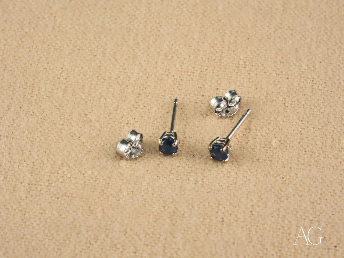 Elegant 18k white gold sapphire earrings with round blue studs