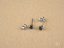 Elegant 18k white gold sapphire earrings with round blue studs