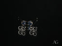 18k white gold sapphire earrings with silver studs and dark blue gems