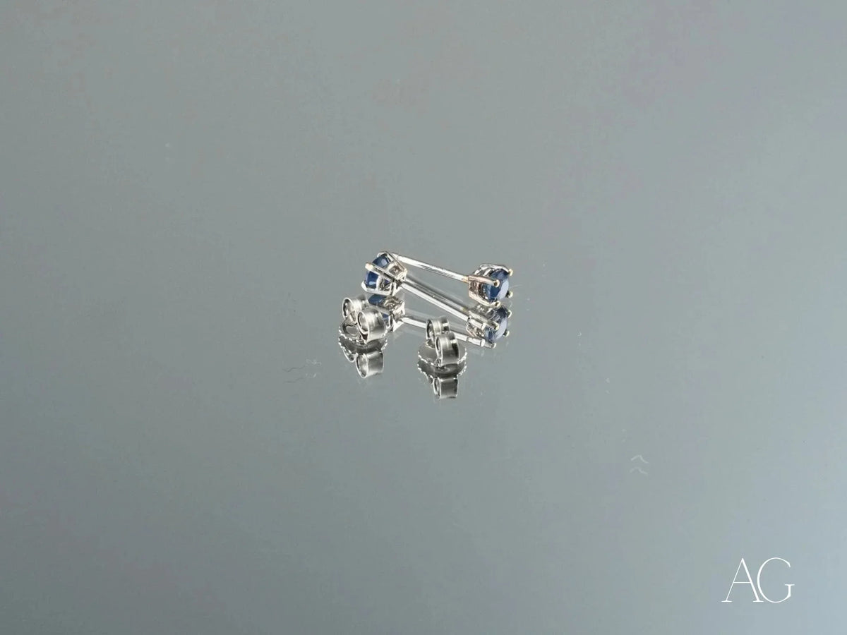 18k white gold sapphire earrings with blue gemstones