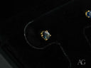 Pair of 18k gold sapphire stud earrings with oval-cut sapphires