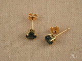 18k gold sapphire stud earrings with oval-cut sapphires and butterfly backs