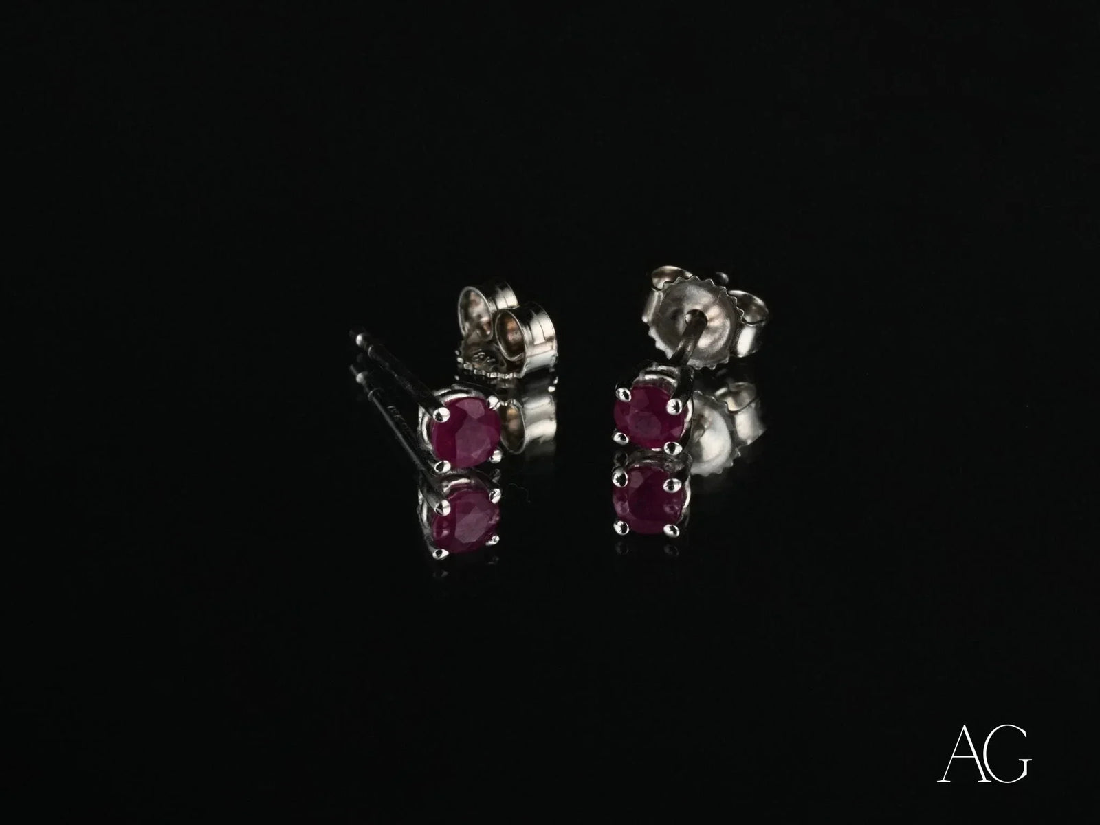 Scarlet Whispers white gold ruby stud earrings with red gems