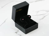 Scarlet Whispers white gold ruby earrings in black box